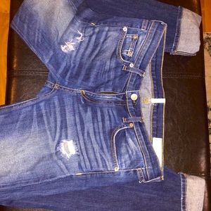 Distressed skinny leg jeans